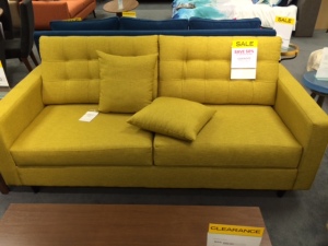 Um, what?! Are we really buying another green couch? Wait a minute...